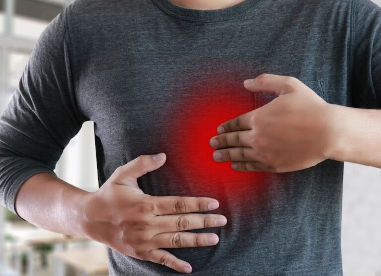 Man with Acid Reflux and Heartburn