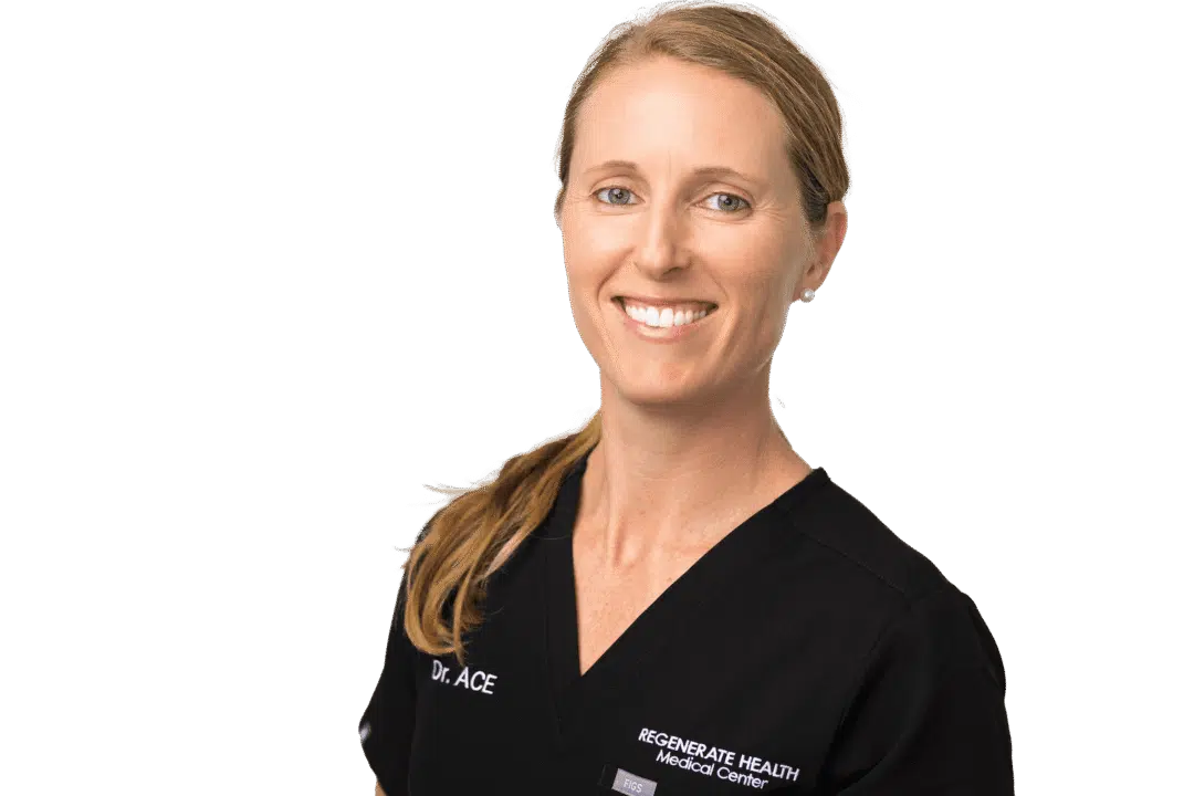 Female medical provider in black scrubs smiling in a horizontal professional staff portrait.
