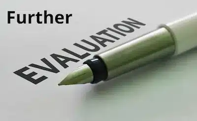 further-evaluation-positive-cancer-blood-test-result Pen pointing to the words 'Further Evaluation,' representing the follow-up steps after a positive cancer blood test result